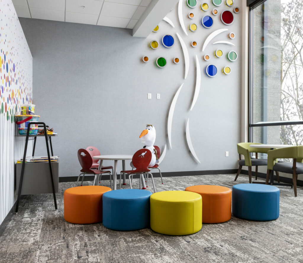 Children's play area with colorful stools at the Ronald McDonald House in Boise