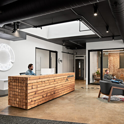 Lounge furniture and a reception desk the lobby area of a co-working space in Spokane