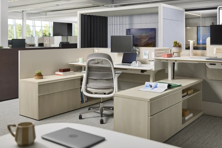 Open office with Haworth height-adjustable desks, Breck task chair, storage and acoustic pods